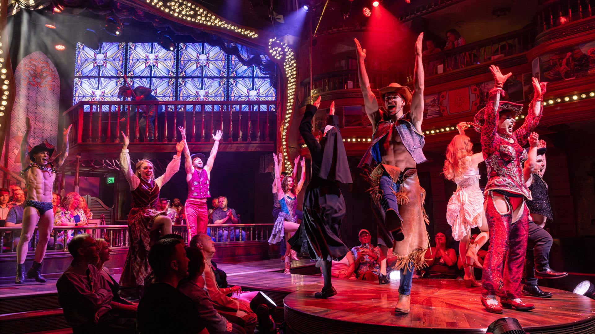 Talents dancing on stage in front of an audience.