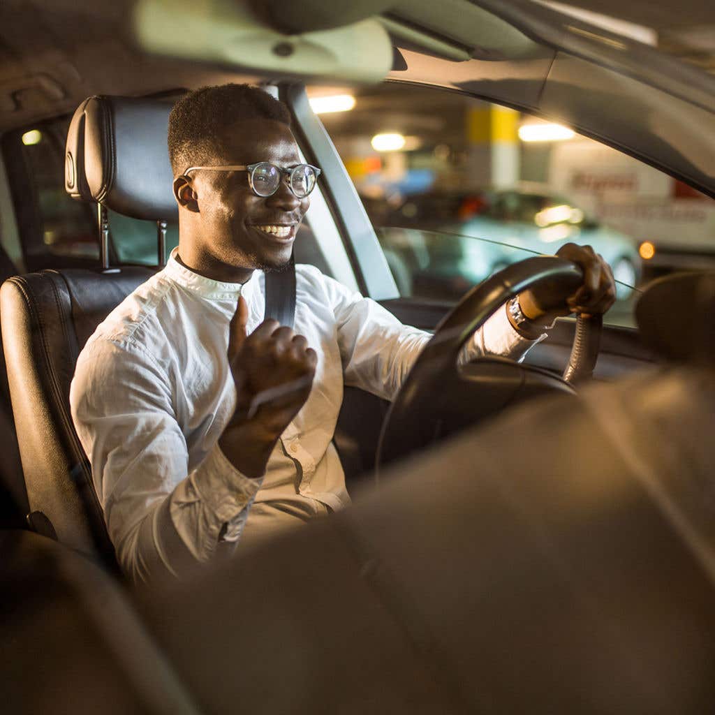 A person driving a vehicle