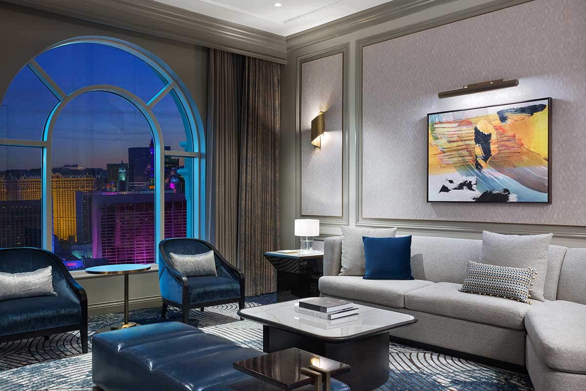 Newly Remodeled Grand One Bedroom with large window view of city skyline and contemporary furnishings.