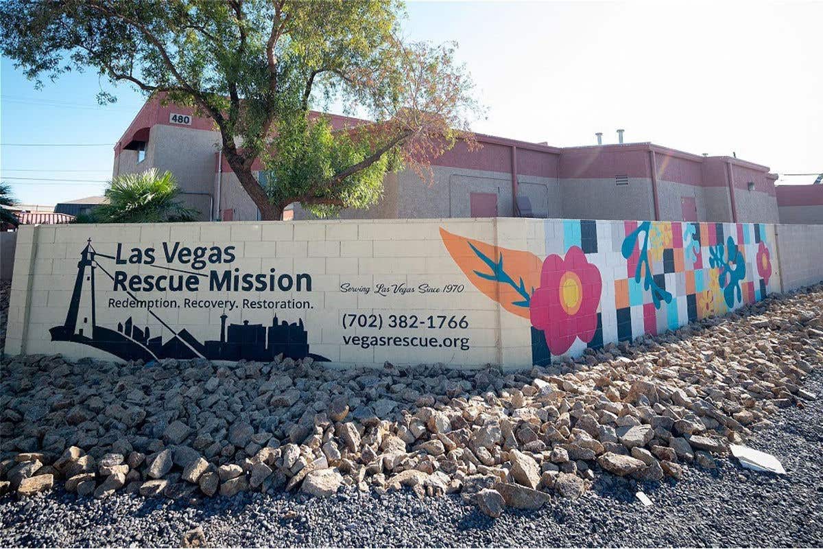 A building with Las Vegas Rescue Mission logo and art.
