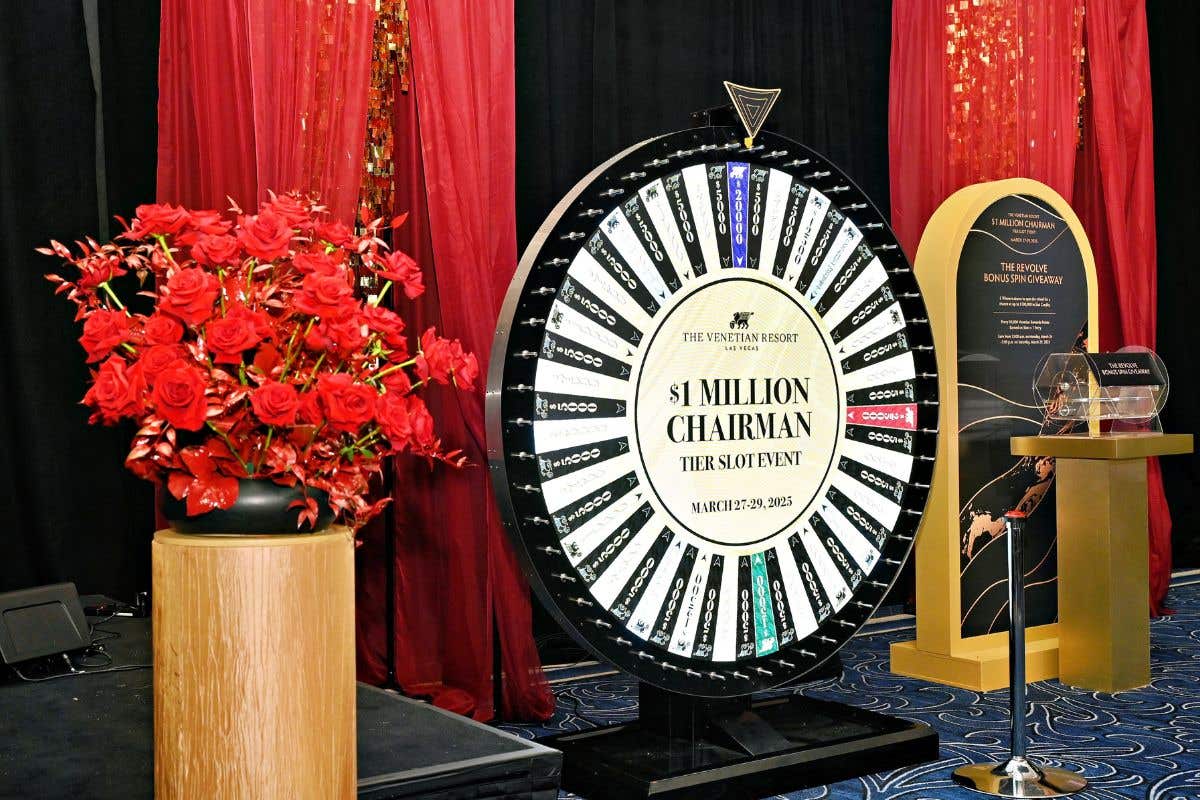 Chairman tier slot event prize wheel with red and gold décor