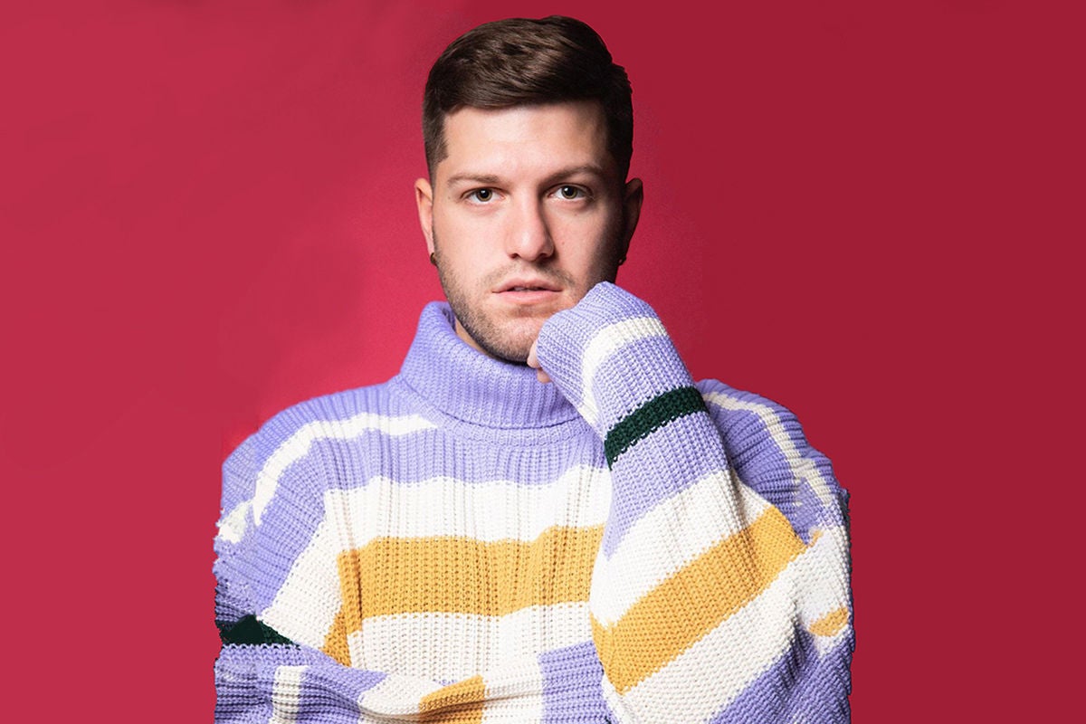 Zachariah Porter in a striped sweater.