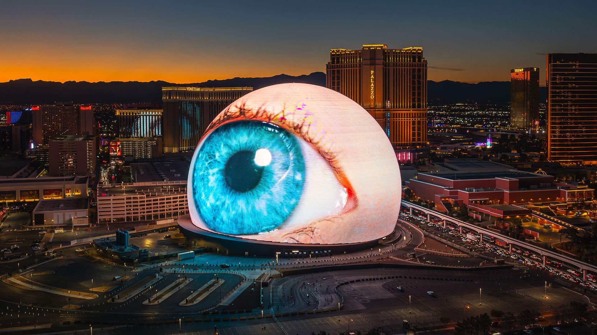Image of eyeball on the Sphere in a sunset scene in front of The Venetian Resort.