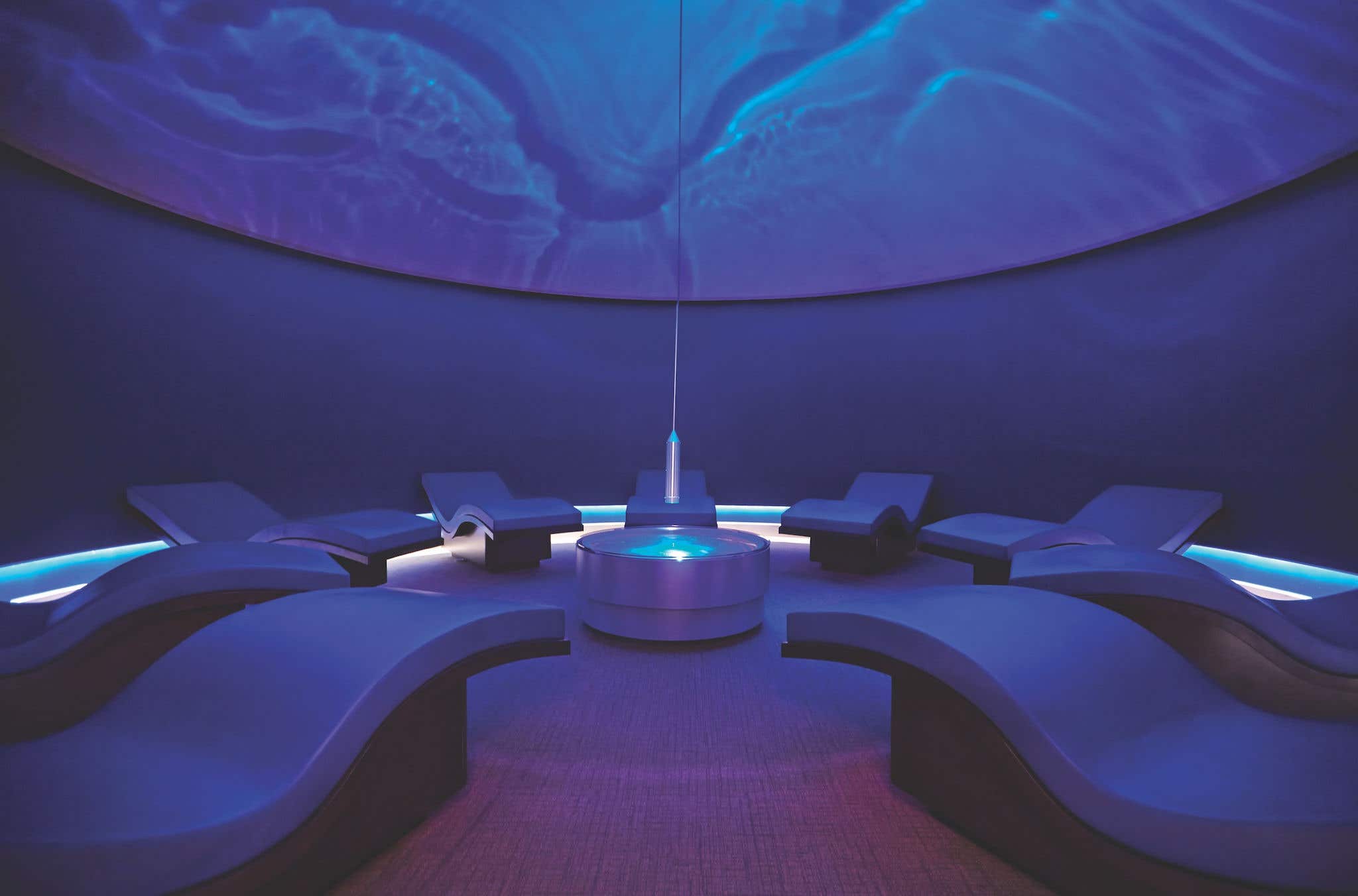 Canyon Ranch SpaClub wave room with blue and purple lighting