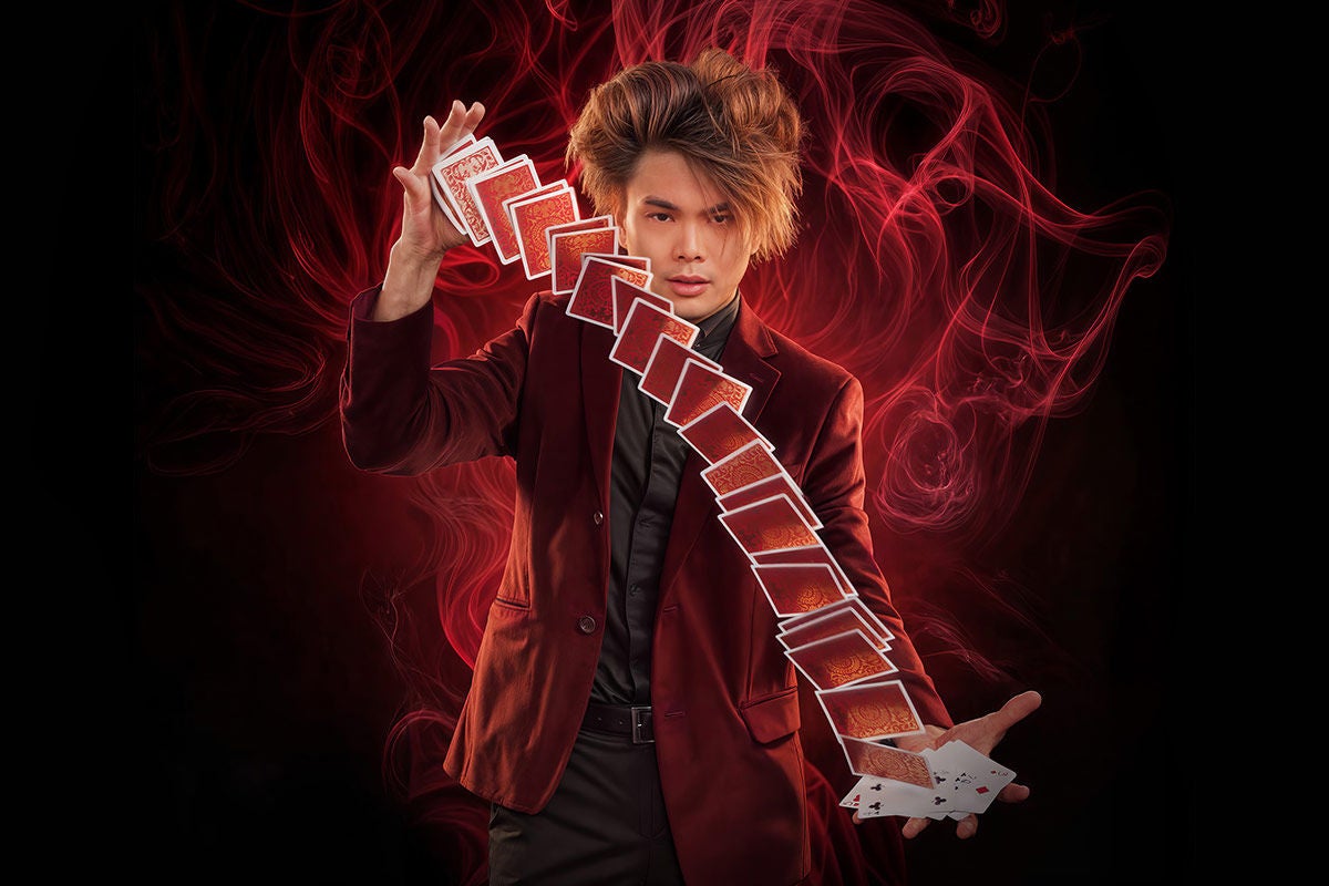 Shin Lim doing a magic trick with cards