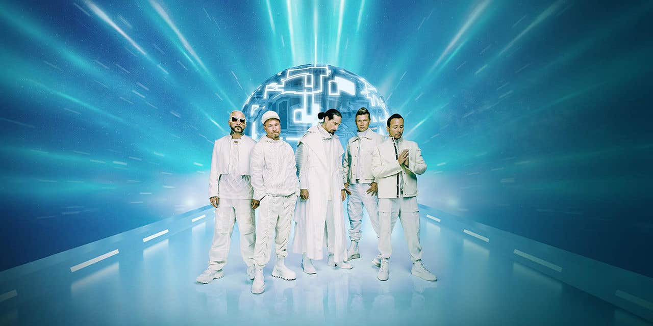 Backstreet Boys Millenium album art showing all 5 band members, dressed in white on blue background.