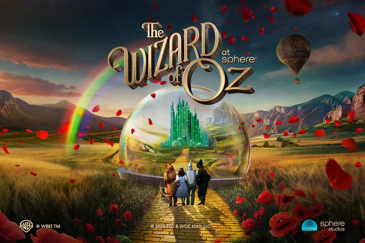 The Wizard of Oz at Sphere poster showing the main characters on the yellow brick road heading towards the Emerald City.