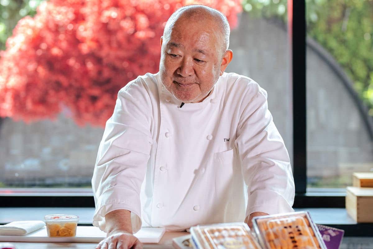 Promotional image featuring chef Wakuda at a counter alongside Pole Position Omakase Experience event branding.