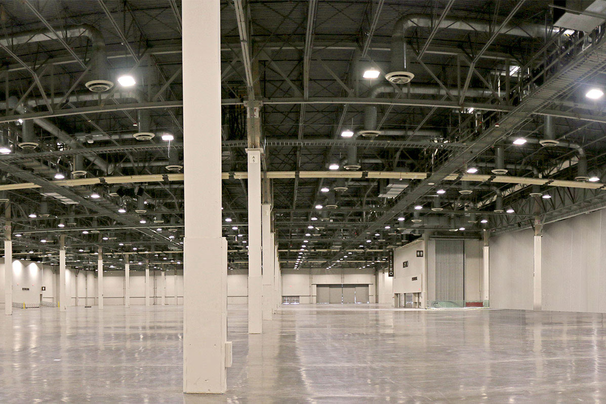 Interior of an expo hall at the Venetian Resort with pillars throughout. 